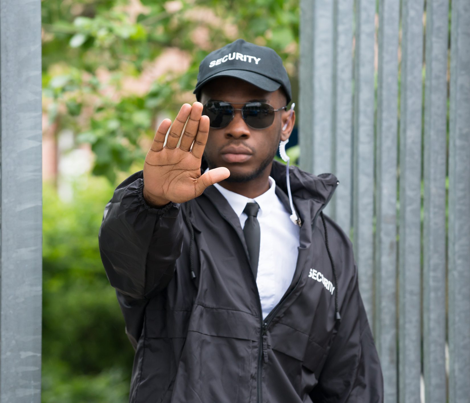 Security Guard Making Stop Gesture